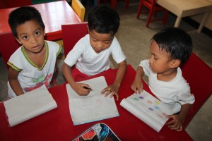 James Jerald Balanes (right), four years old, is one of the students of the newly constructed Kalahi-CIDSS daycare center in Barangay Irayang Solong, Camarines Sur.